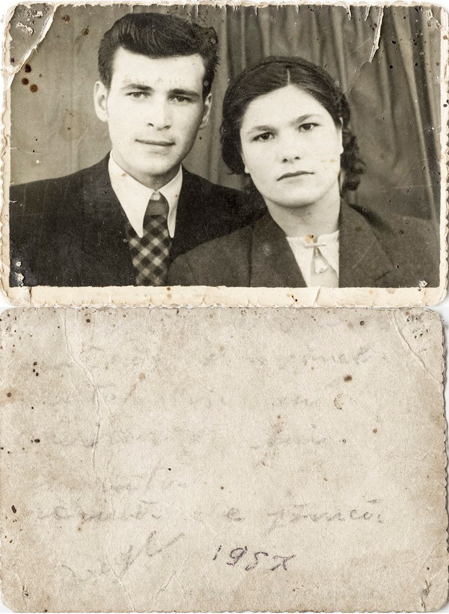 Sepia portrait of a couple, creased across the middle